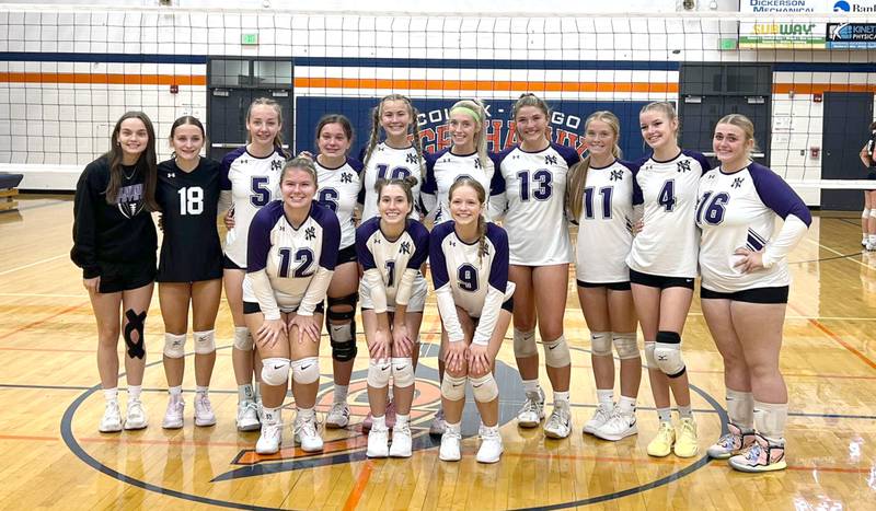 Nodaway Valley/OM's volleyball team celebrates a third place finish at the Colfax-Mingo tournament Saturday, Aug. 30.