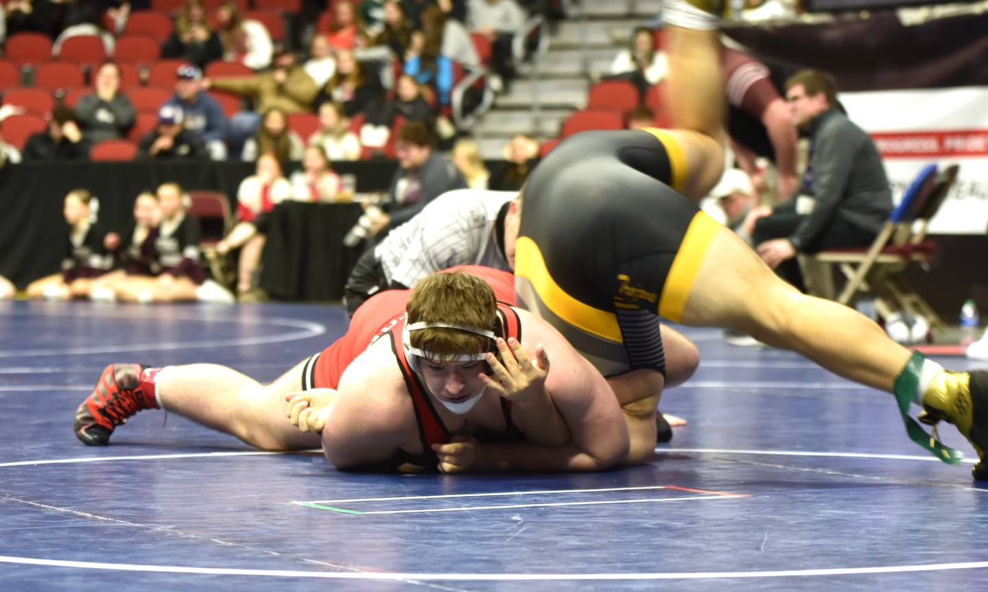 Max Chapman holds Evan Sorensen of Atlantic to the mat in the blood rounds Friday. Chapman won the bout and advanced to take fifth at 285.