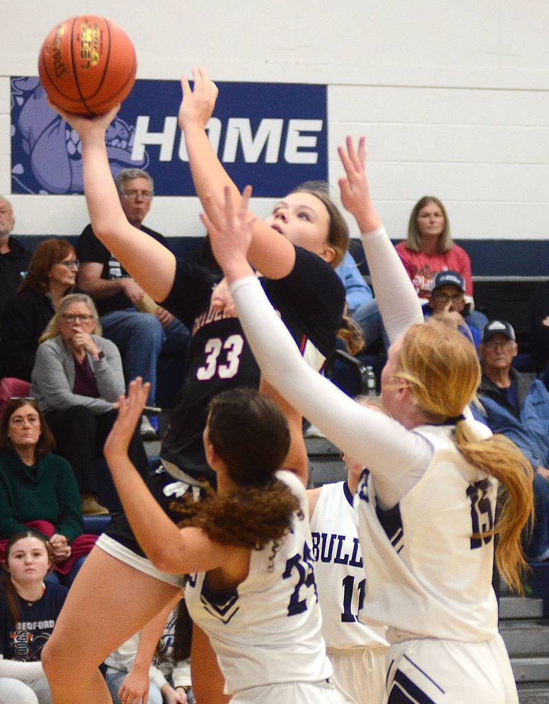 Mount Ayr's Izzy Gilbertson drives to the basket against Bedford Thursday. Gilbertson had 24 points, 13 rebounds and nine steals in the 47-27 win over the 15th-ranked Bulldogs.