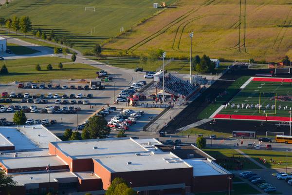 High school tennis courts planned to replace part of gravel parking lot