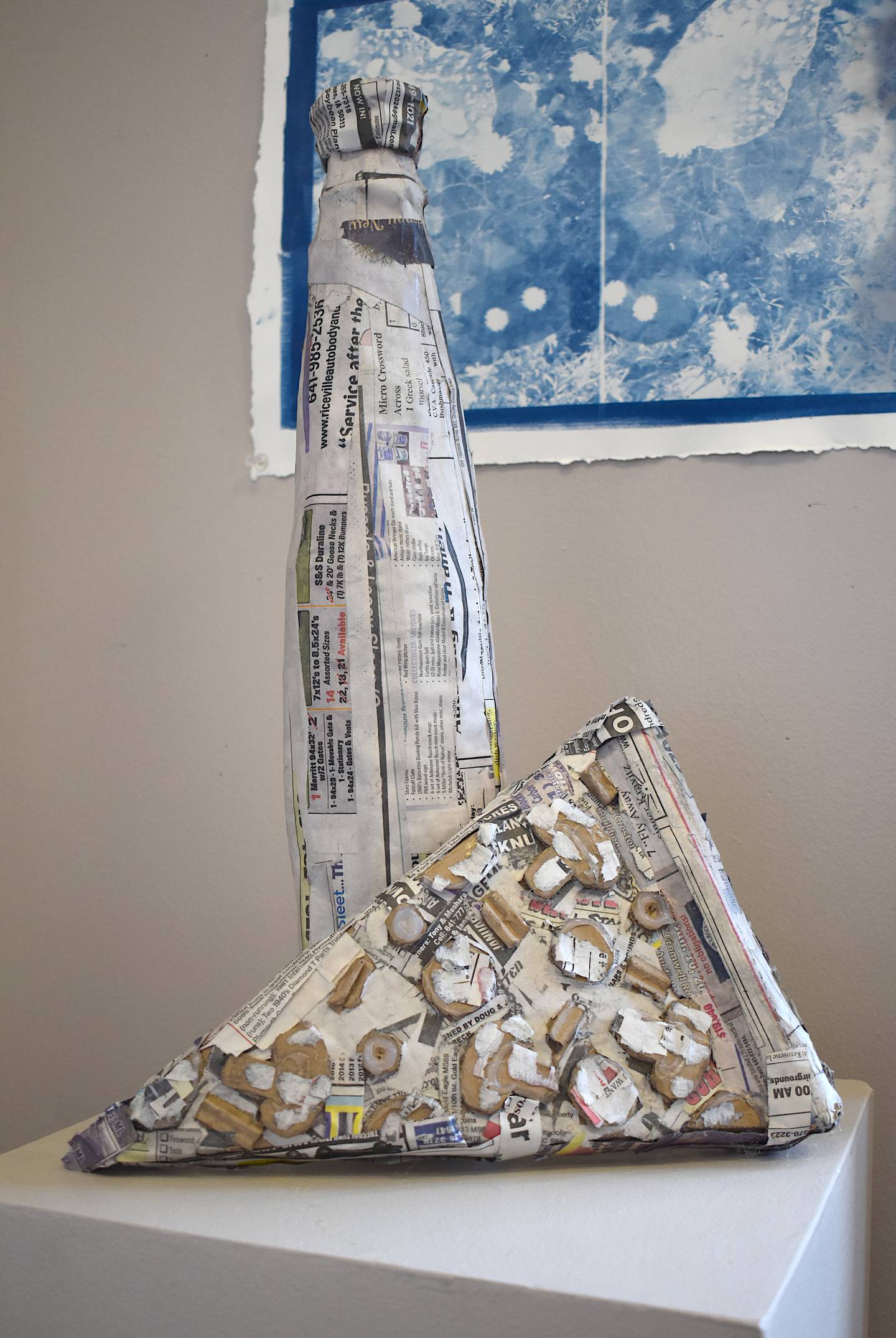 Sculpture work at the "Make It Happen" exhibit, showcasing recycled materials.