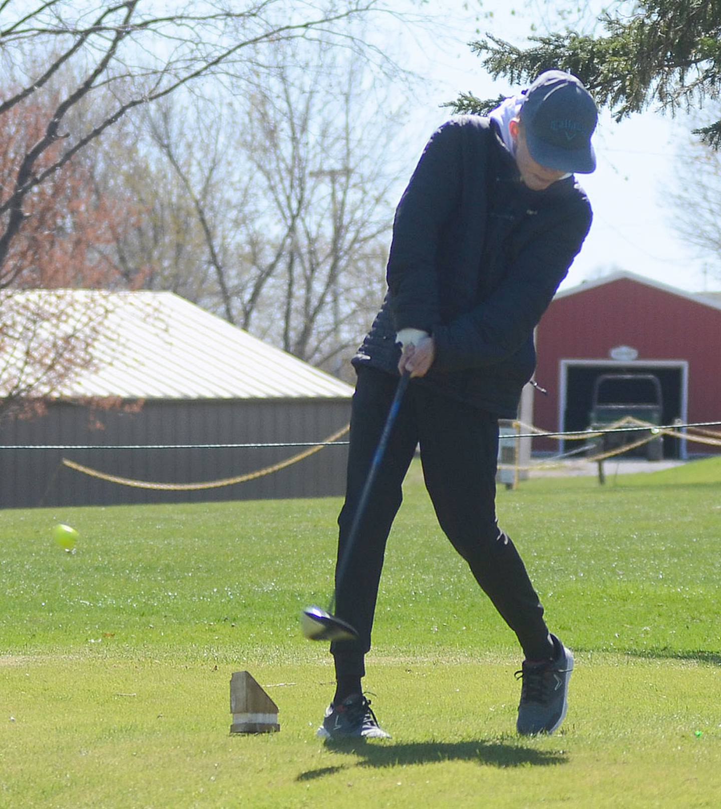 Garrett Troutwine of Creston tees off on No. 4 at Crestmoor Golf Club.