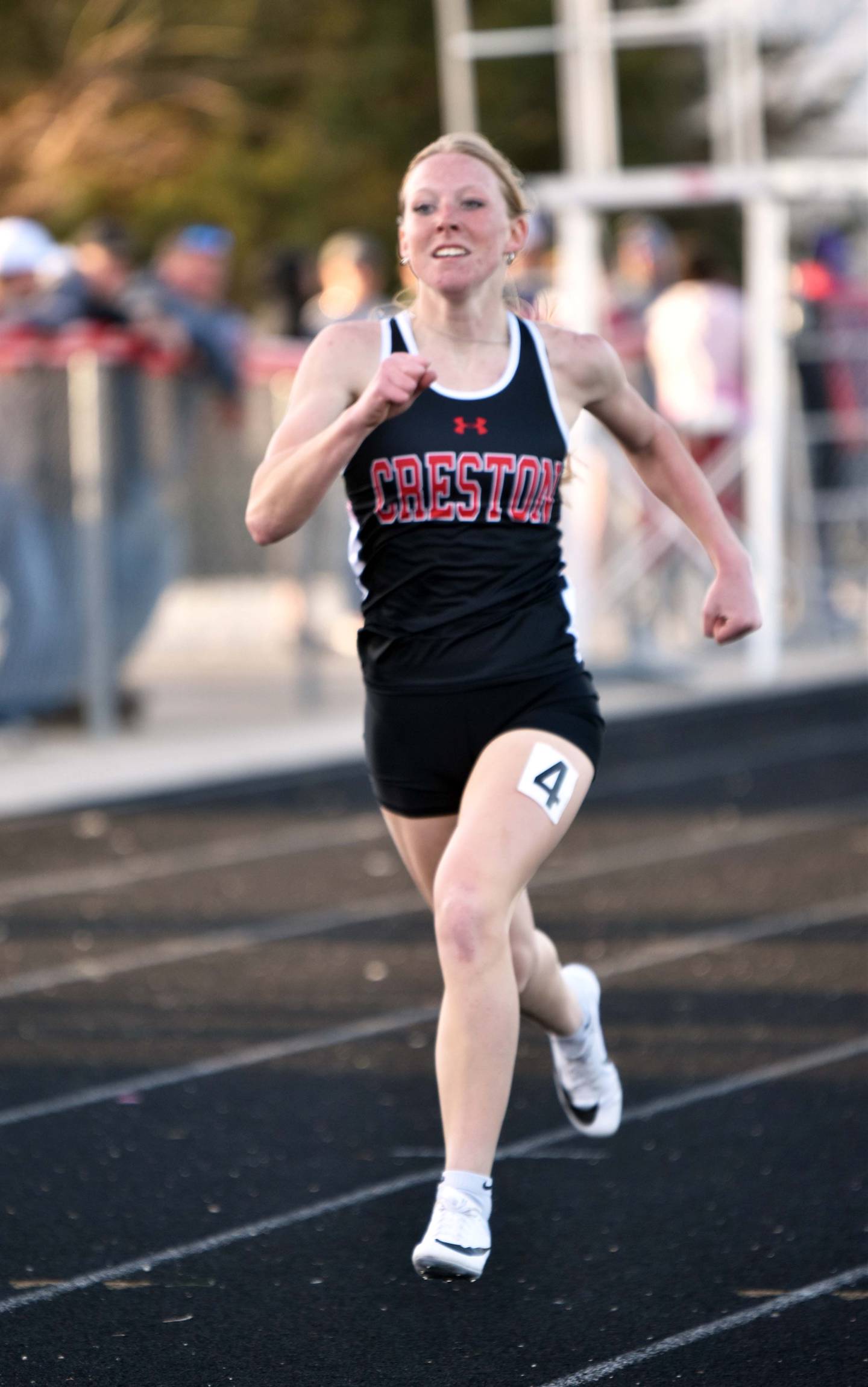 Creston’s Avery Staver wins the girls 400m dash Monday at the Creston Coed in a time of 1:02.53.