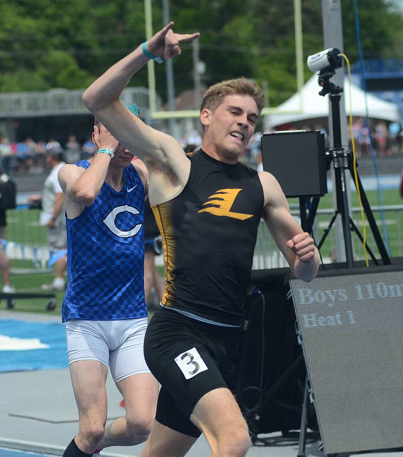 Lenox senior Gabe Funk celebrates his victory in the 110-meter hurdles in 14.20, successfully defending his title in a time of 14.20. Funk also won the 400-meter hurdles and was runner-up in the 400 meters.