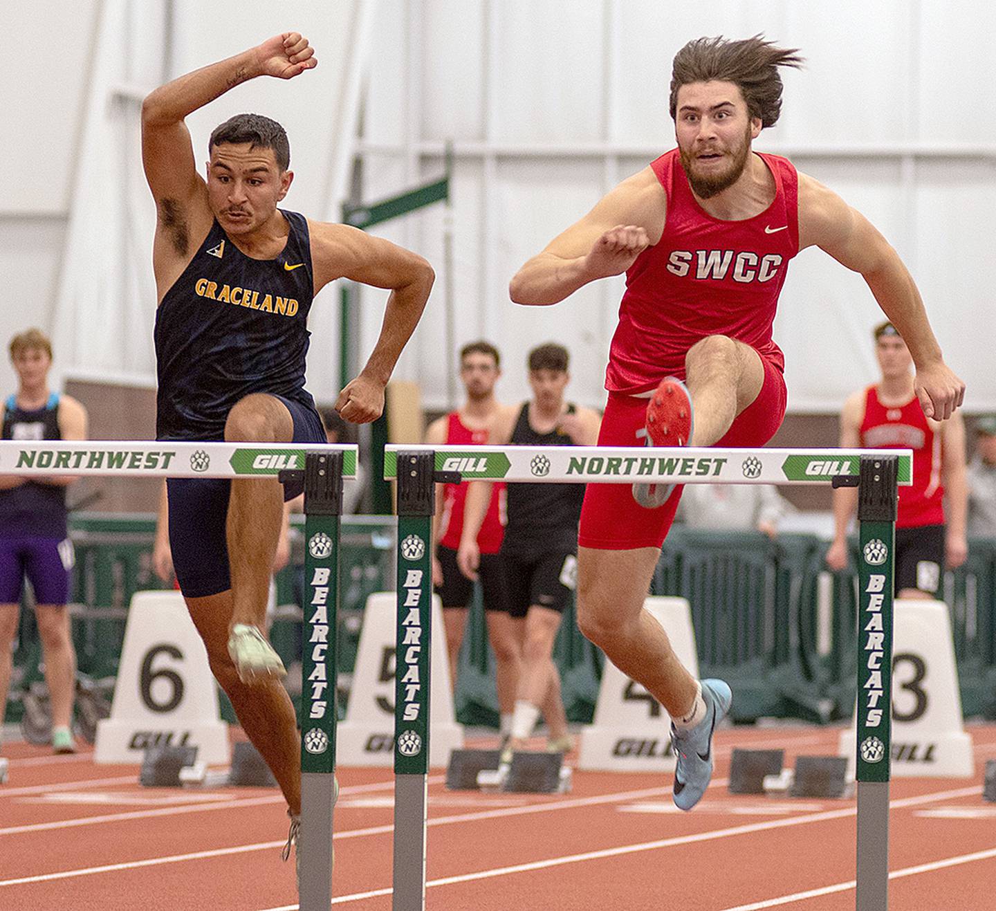 SWCC freshman Sam Foreman (right) shown competing at the Northwest Missouri State indoor meet, ran the 60-meter hurdles at the NJCAA national meet in Gainesville, Florida. He set the school record of 8.68 seconds at Maryville.