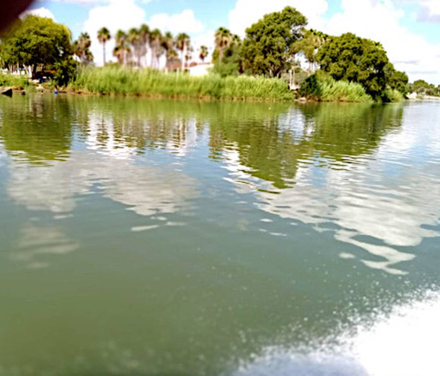 A narrow point of the Rio Grande River, what people from Mexico cross to enter the United States.