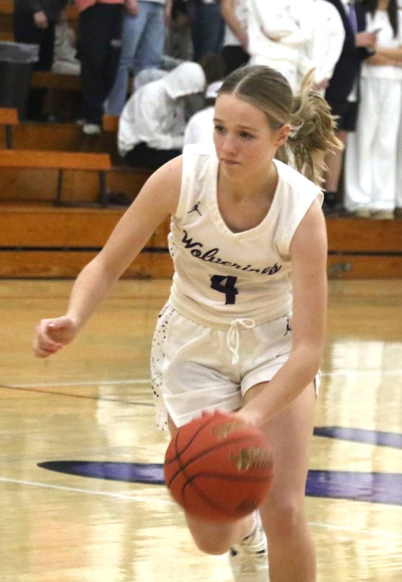 Wolverine freshman Sofie Rardin brings the ball up the court in a recent girls basketball game. As of Monday, the Wolverines had won 10 games in a row.