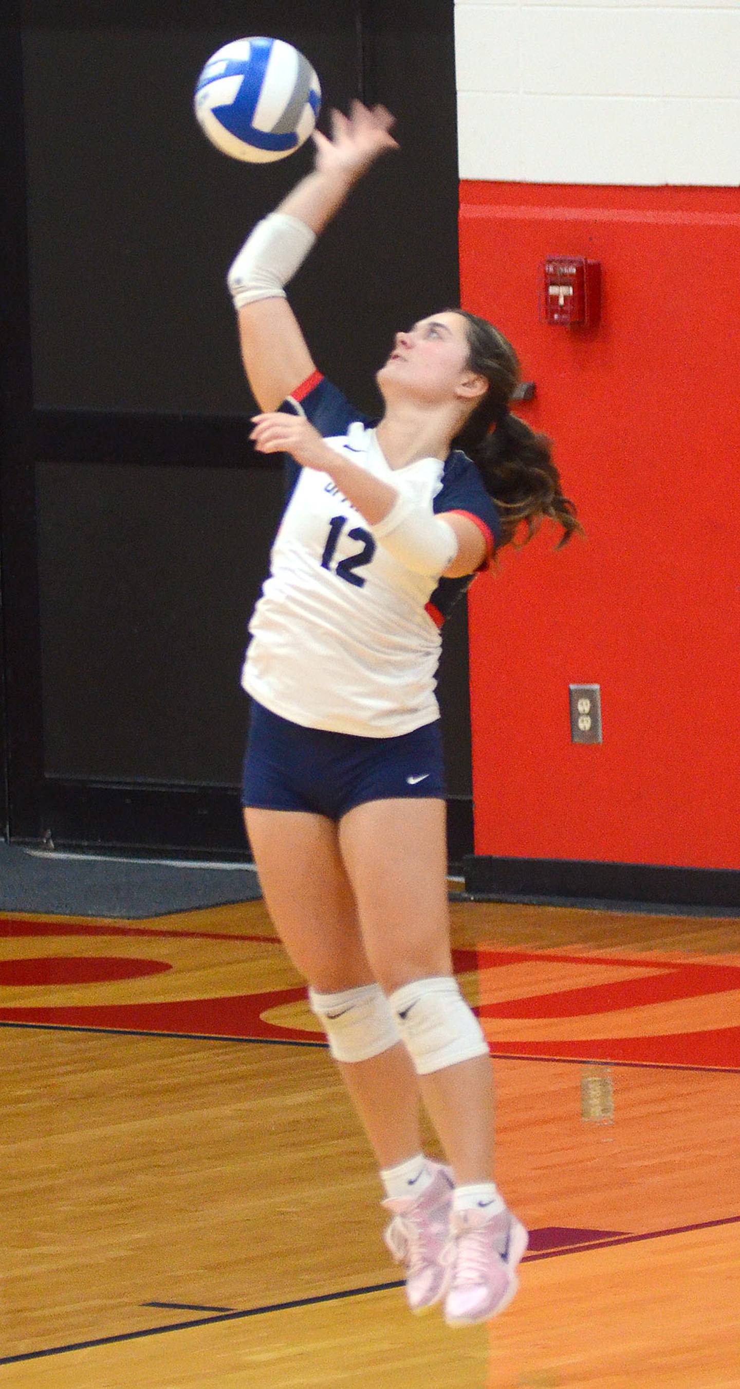 Southwestern freshman Emma Follman (12) serves against Kirkwood. Follman had two aces.