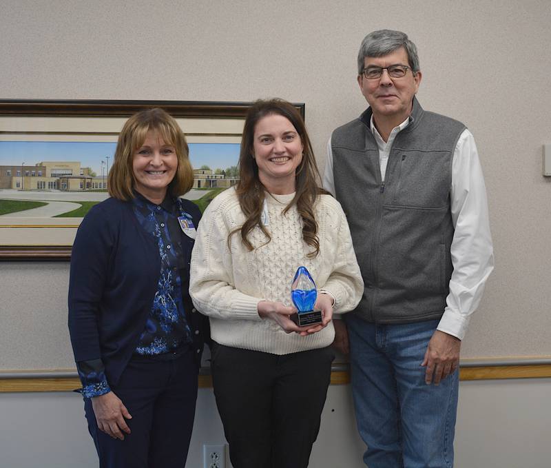 Greater Regional Chief Human Resources Officer Amy Rieck receives a reward for being the UnityPoint Outstanding Rural Leader. From left to right, UnityPoint Director of Rural Health Resources for UnityPoint Health - Des Moines Teresa Newman, Rieck, Chairman Tom Lesan.