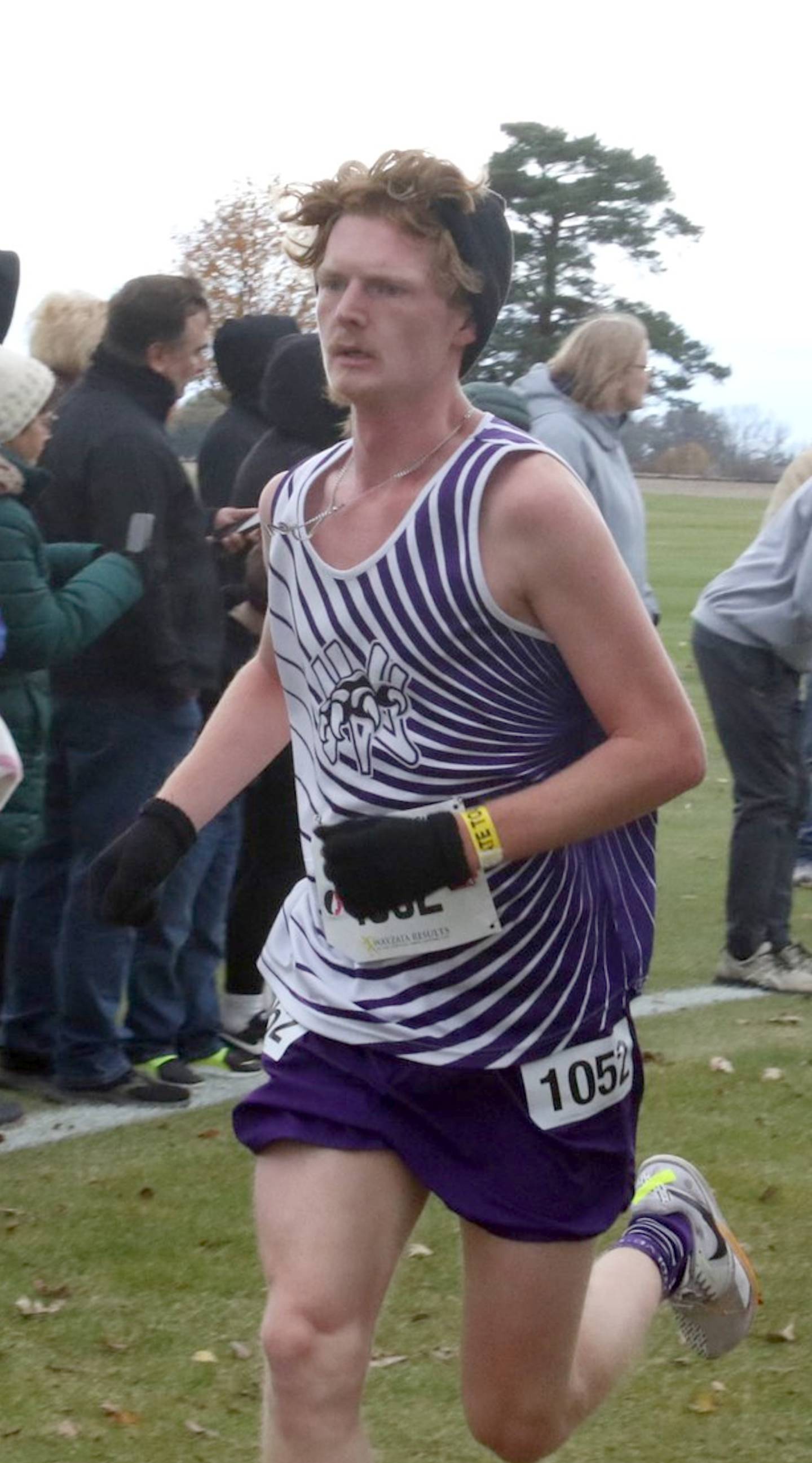 Wolverine junior Haden Colton focuses on picking off the next competitor in the state cross country race Saturday.