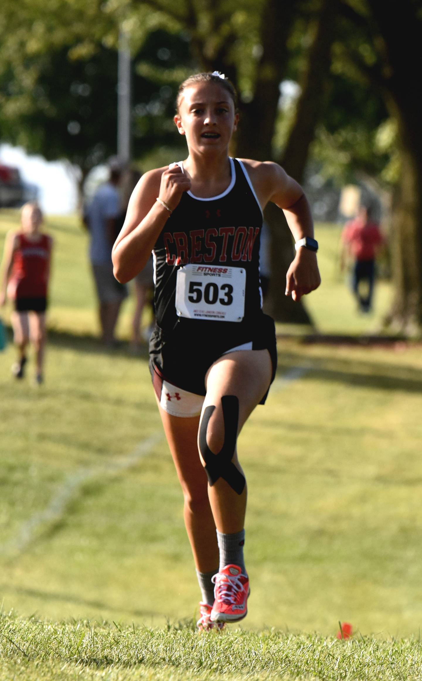Abby Freeman earned her first medal Thursday at the I-35 Invite in Indianola with a 15th place finish.