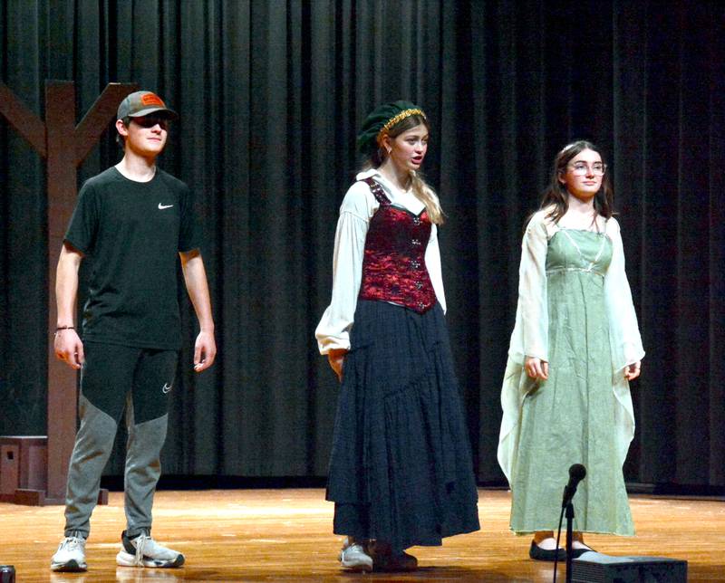 From left, Micah Cronk, Bella Day and Melanie Kilborn prepare for Nodaway Valley's musical "Gideon and the Blundersnorp," which plays Friday and Saturday evenings.