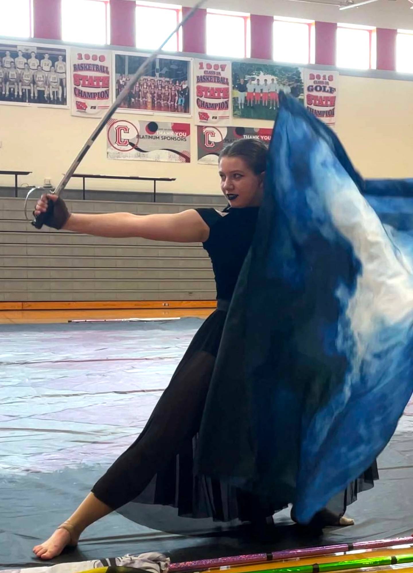 Collins was the guard captain at Creston High School her senior year. Pictured is her senior performance at the annual CHS Fine Arts Fest.
