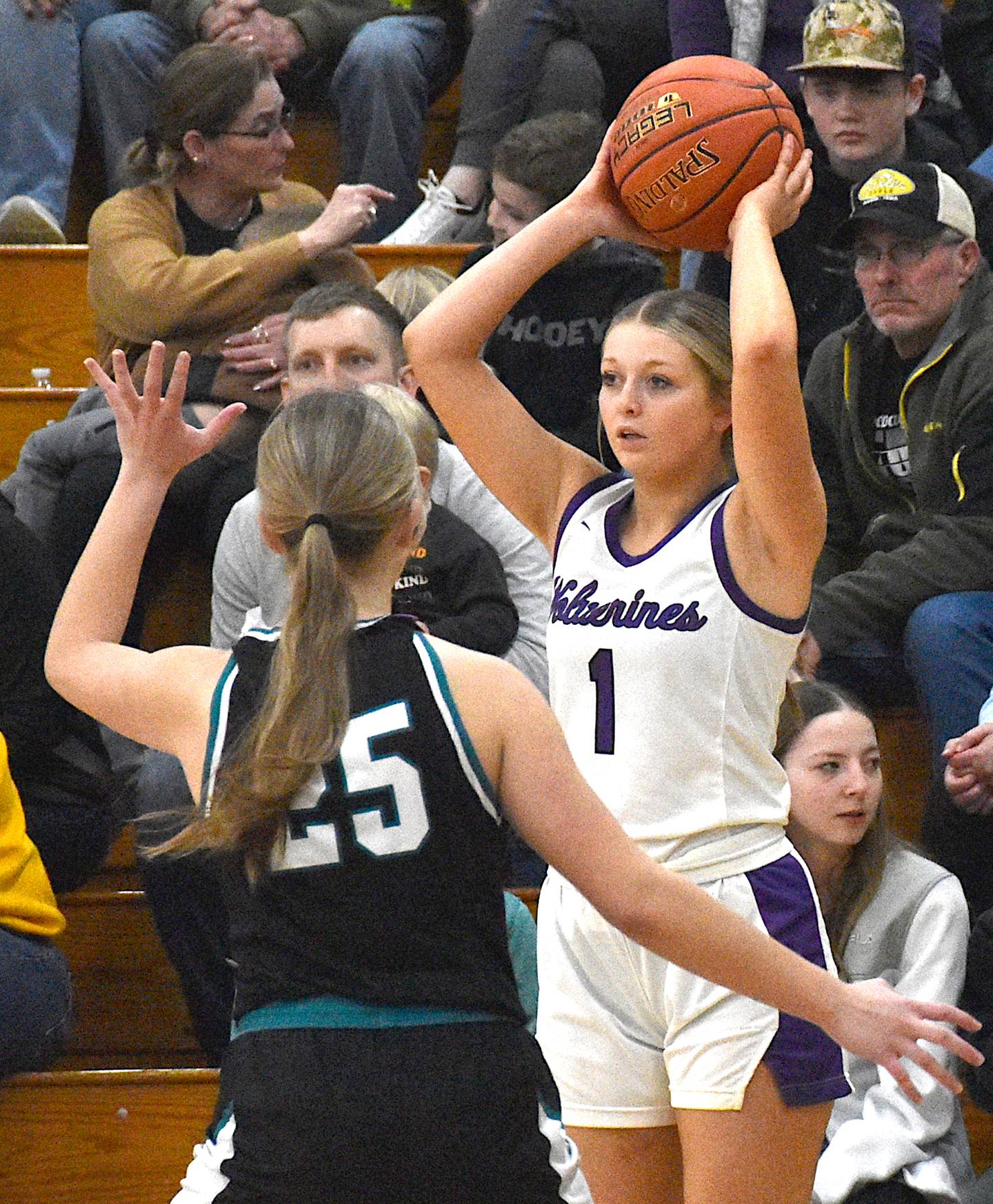 NV junior Taylor Day (1) looks for an open teammate against Southwest Valley in a Friday, Feb. 16 regional semifinal.
