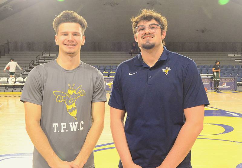 Former Graceland University basketball teammates Austin Schulte (left) and Kaden Briggs of Creston (right) served together as coaches this season.