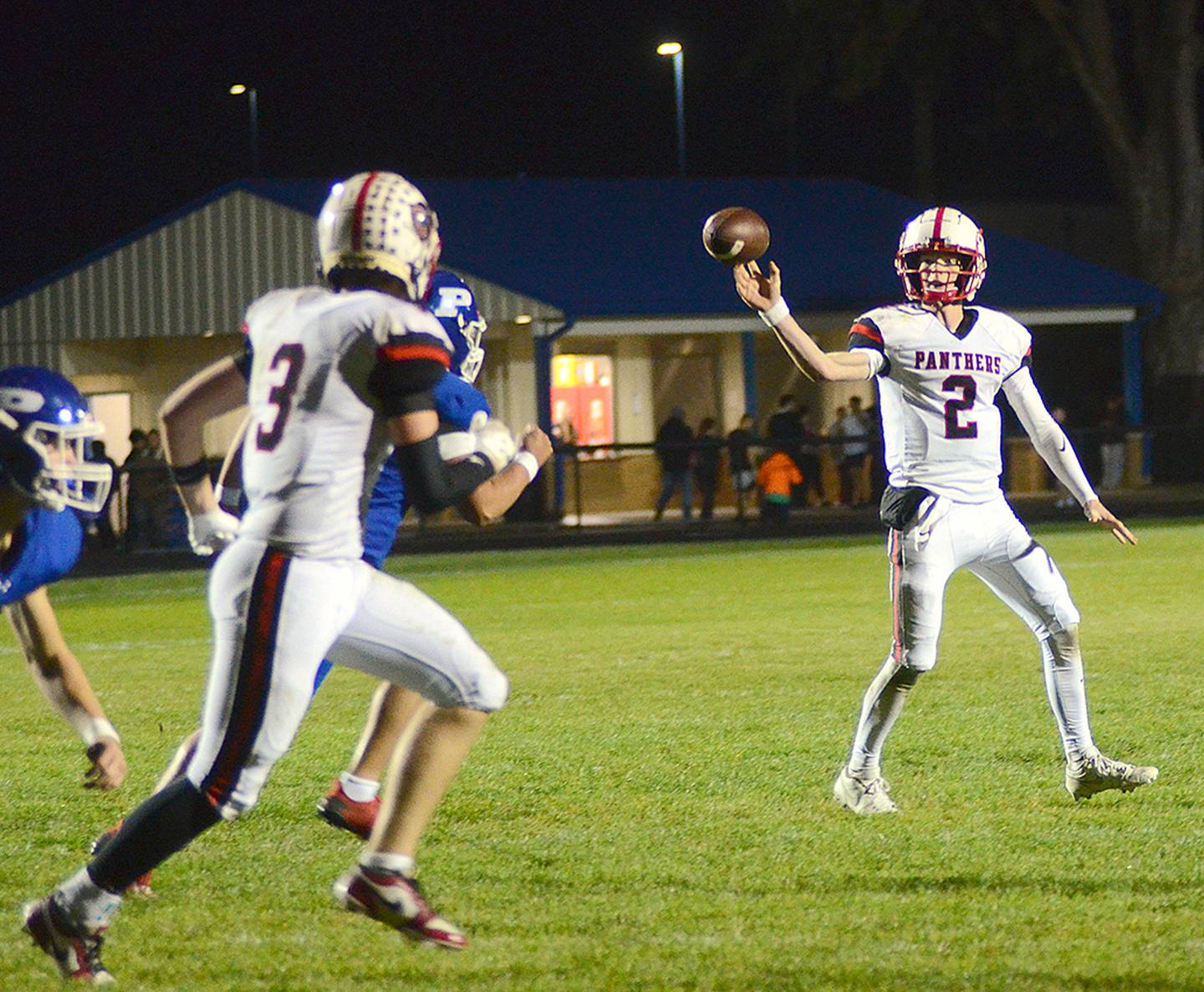 Creston quarterback Tanner Ray passes to tight end Rhett Driskell (3) for a 10-yard touchdown during Friday's game. Ray passed for 263 yards and two touchdowns and ran for 229 yards and six TDs.