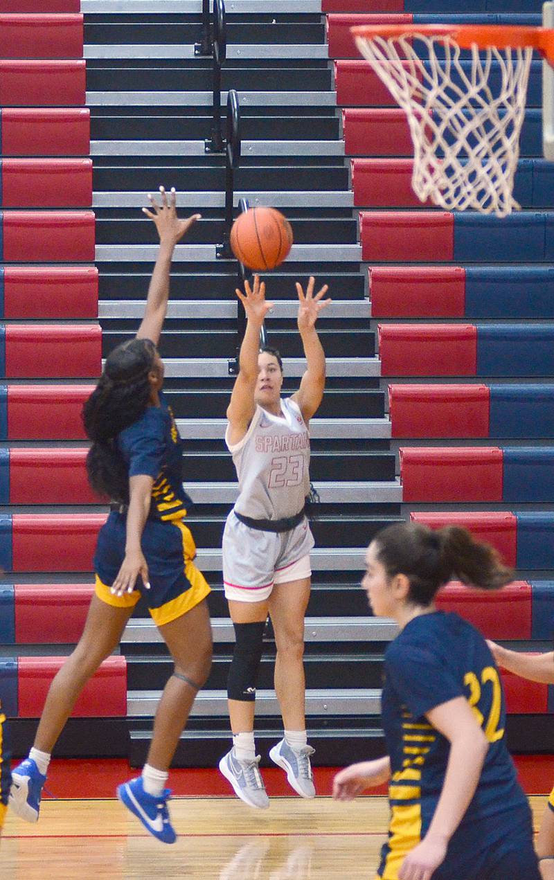 Southwestern freshman guard Shyla Moore takes a 3-point shot from the corner against Marshalltown Saturday. Moore scored 10 points in the 64-46 victory.