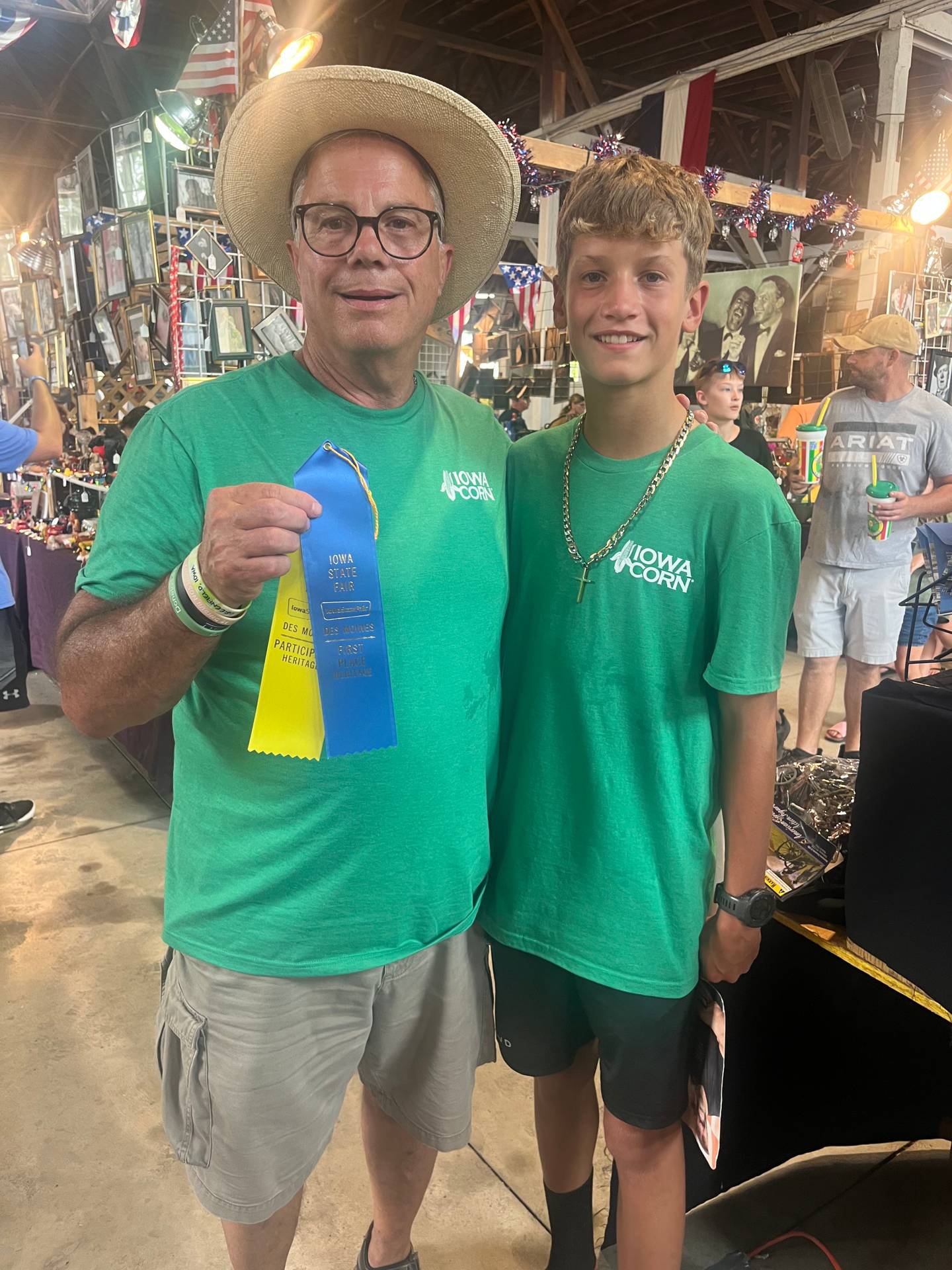 Bill Yount, with his grandson Dominic, after winning the hog calling contest at the Iowa State Fair.