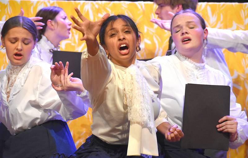 Creston's choral reading team performs "The Yellow Wallpaper" Tuesday during their Dessert Theatre. Mahi Patel, center, performed in a leading role for this show.