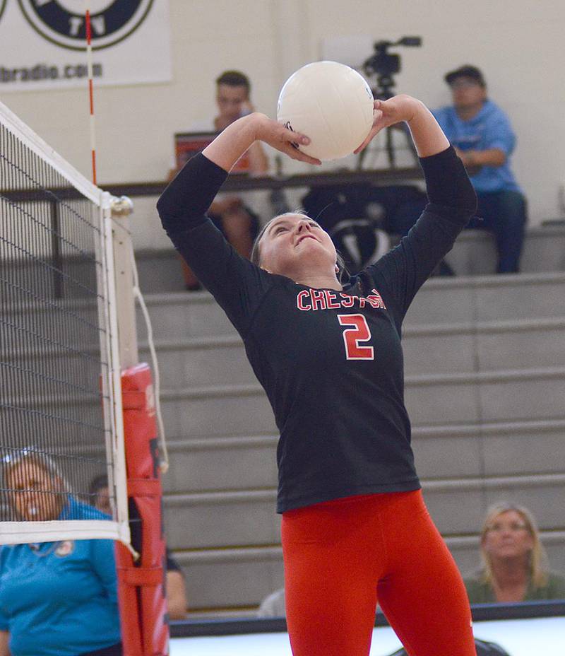 Creston's Hollyn Rieck rises up for a setter dump over the net against Lewis Central Tuesday night. Rieck had two kills in that 3-0 loss. She also stroked two ace serves against Atlantic.