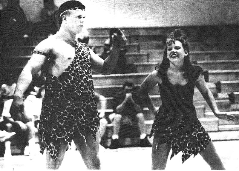 Creston students Jamie Travis and Meg Richardson do their best dance routines to the song “Walk the Dinosaur,” during Pepper’s Night at the high school Monday. Richardson and her Pepper squad entertained the crowd with five dance routines.
