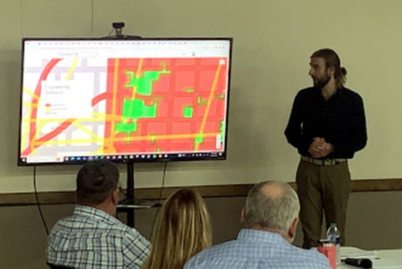 Invengery's Steve Morris shares a setback demonstration Sept. 19 at an Adams County Zoning Commission meeting at the Corning Community Center.