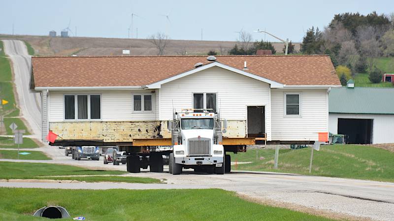 Ensor Movers transports at house down Highway 25 into Greenfield Tuesday, April 22. The house was between Greenfield and Fontanelle but it is now on East Iowa Street in Greenfield.