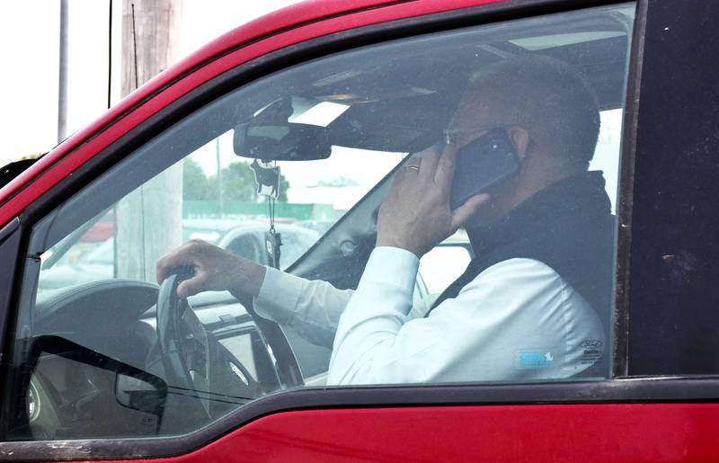 A law going into effect July 1 will ban Iowans from handheld usage of electronic devices while driving.