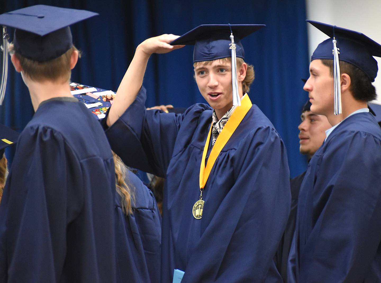 Logan Findley holds his cap during East Union's graduation ceremony.