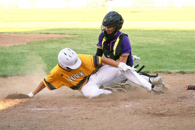 Laramie Stoaks of Lenox makes it home on a double by Brody Brokaw May 29 in a 9-1 win at home over Murray.