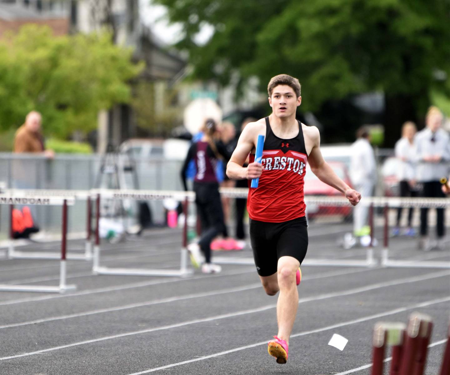 Brandon Briley runs the anchor leg of the 4x800m relay. The relay took second while the boys team placed seventh overall.