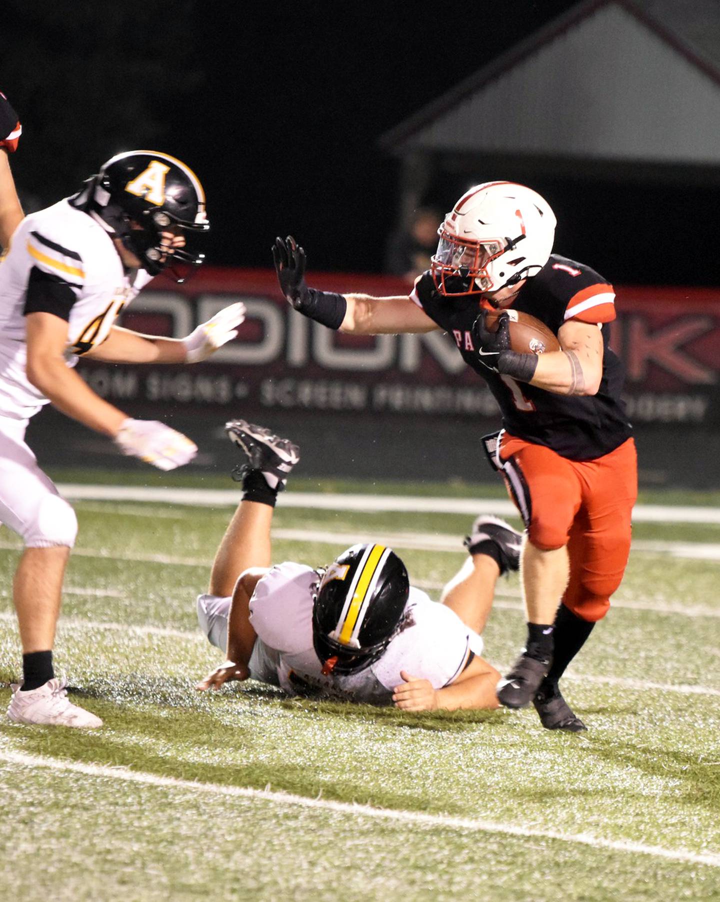 Weston Trapp evades defenders in a 65-yard rushing touchdown. Trapp had four TDS and 359 all-purpose yards.