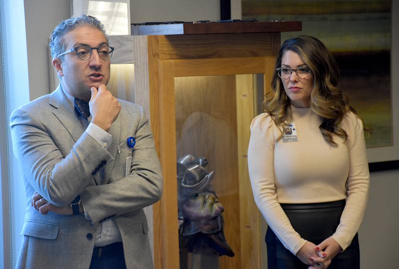 Dr. Mathew Wehbe and oncology practitioner Brooke Wehbe introduce themselves during. reception at Greater Regional Health about their cancer treatment services.