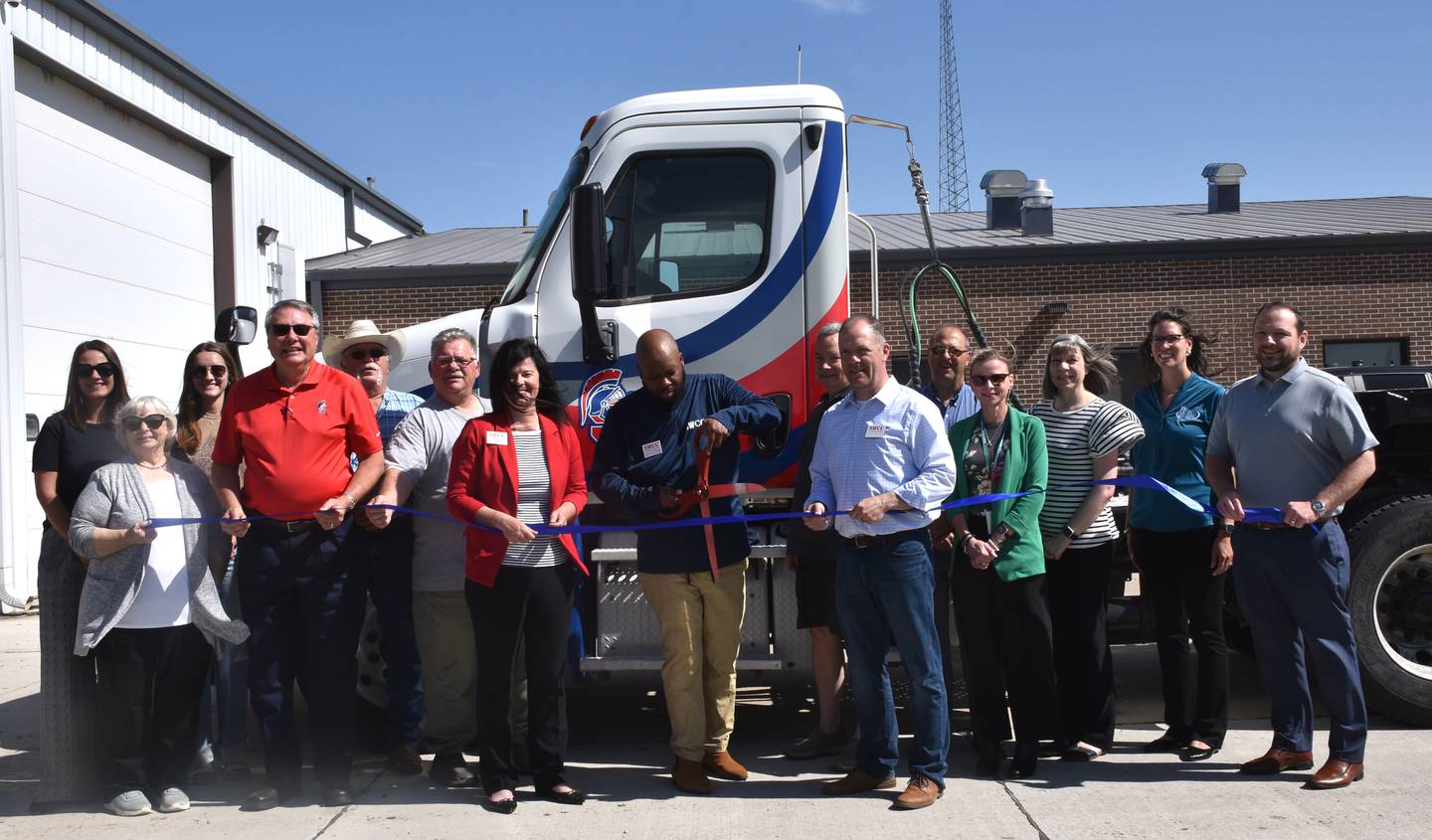 SWCC Transportation Training Coordinator Dante Powell cuts the ribbon at the grand opening of the new Transportation Training Center.