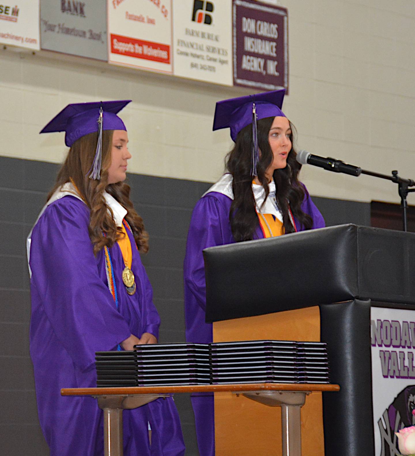 Delaney Blomme and Olivia Laughery speak during Nodaway Valley's graduation.