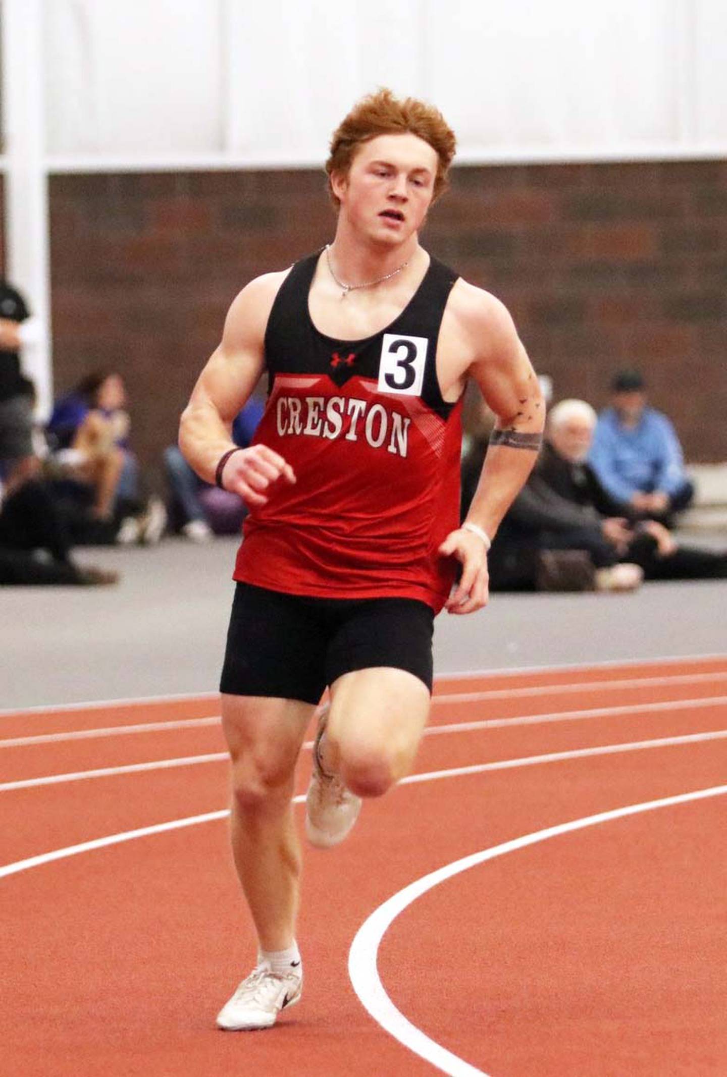 Weston Trapp of Creston runs in the 400m dash where he placed eighth with a time of :56.48