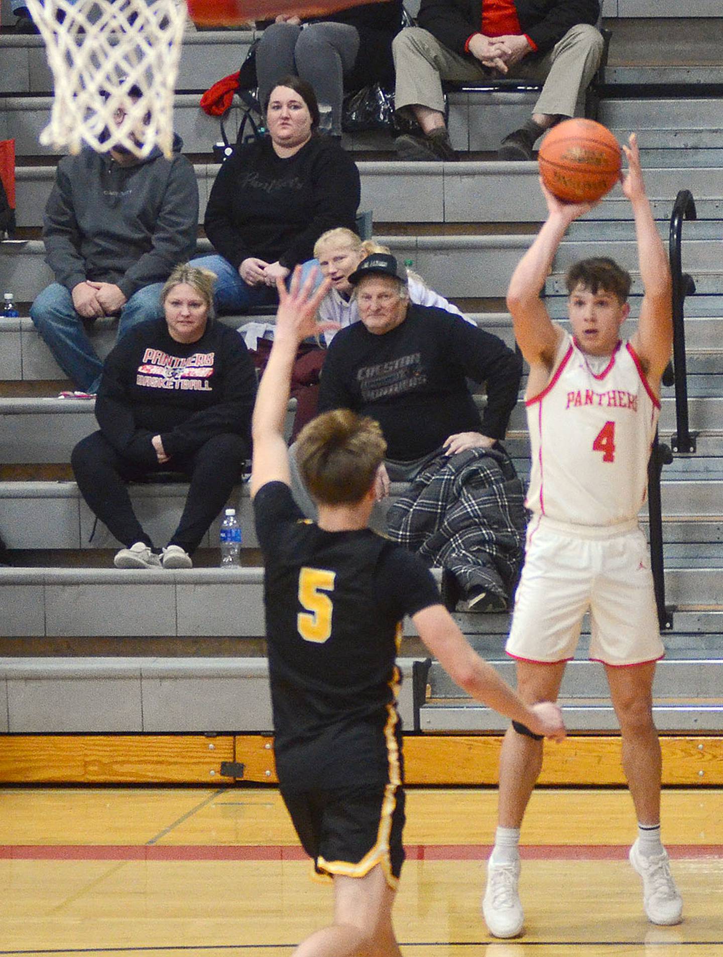Cael Barton of Creston shoots a 3-pointer against Atlantic Monday. Barton made two 3-pointers in scoring 12 points.