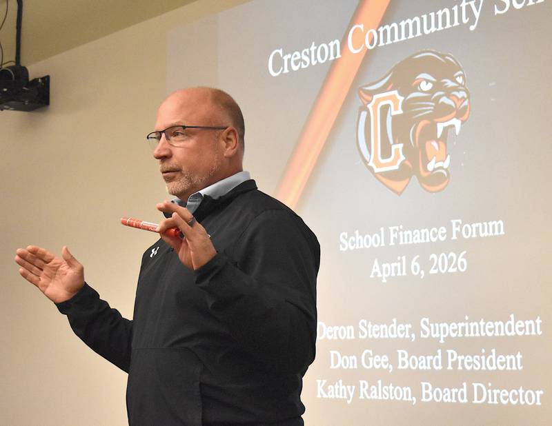 Deron Stender presents finance information during last week's school finance forum.