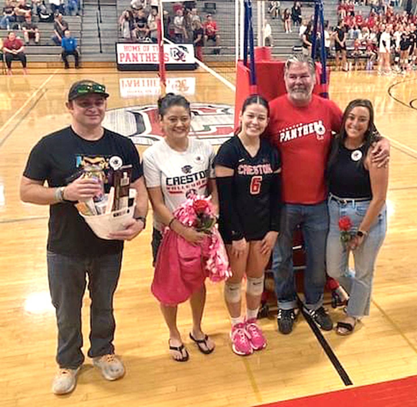 Creston senior Mila Kuhns with parents Daniel and Kiki Scarberry (left) and Nate and Emily Kuhns.