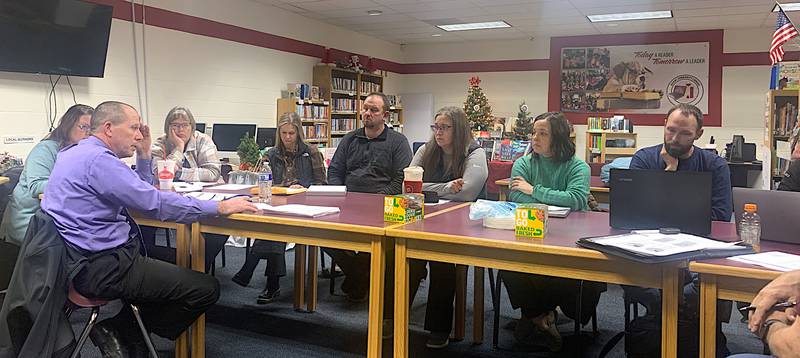 Nodaway Valley and Orient-Macksburg school board members listen to each other during a recent joint school board meeting.