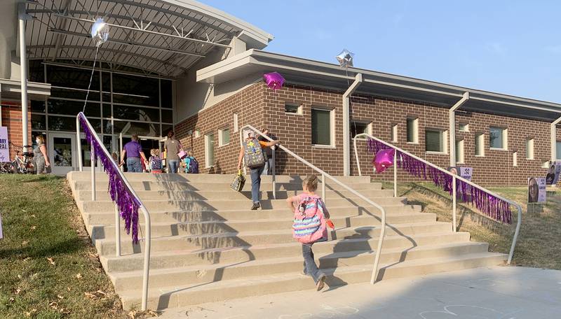 Students arrive at Nodaway Valley Elementary School on a past first day of school.