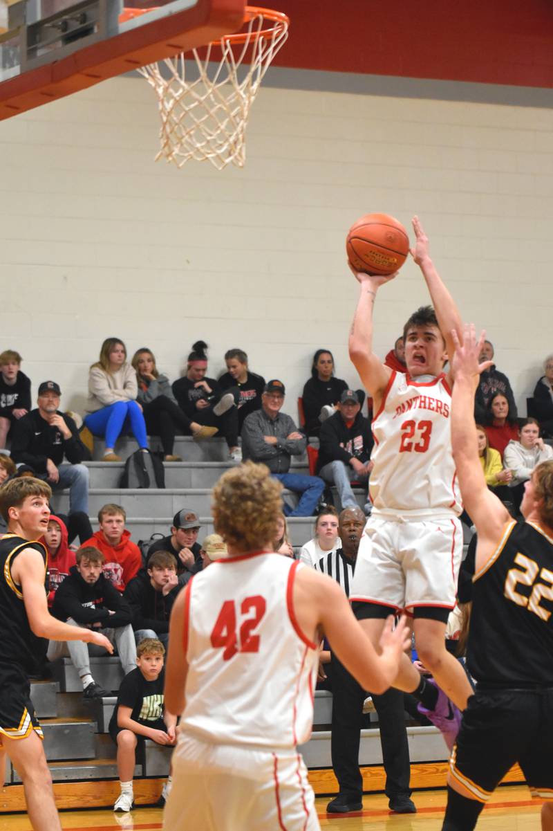 Junior Jake Hoyt puts up a shot Monday against Winterset. Hoyt led the Panthers with 21 points and eight rebounds in the 87-35 loss in the season opener.