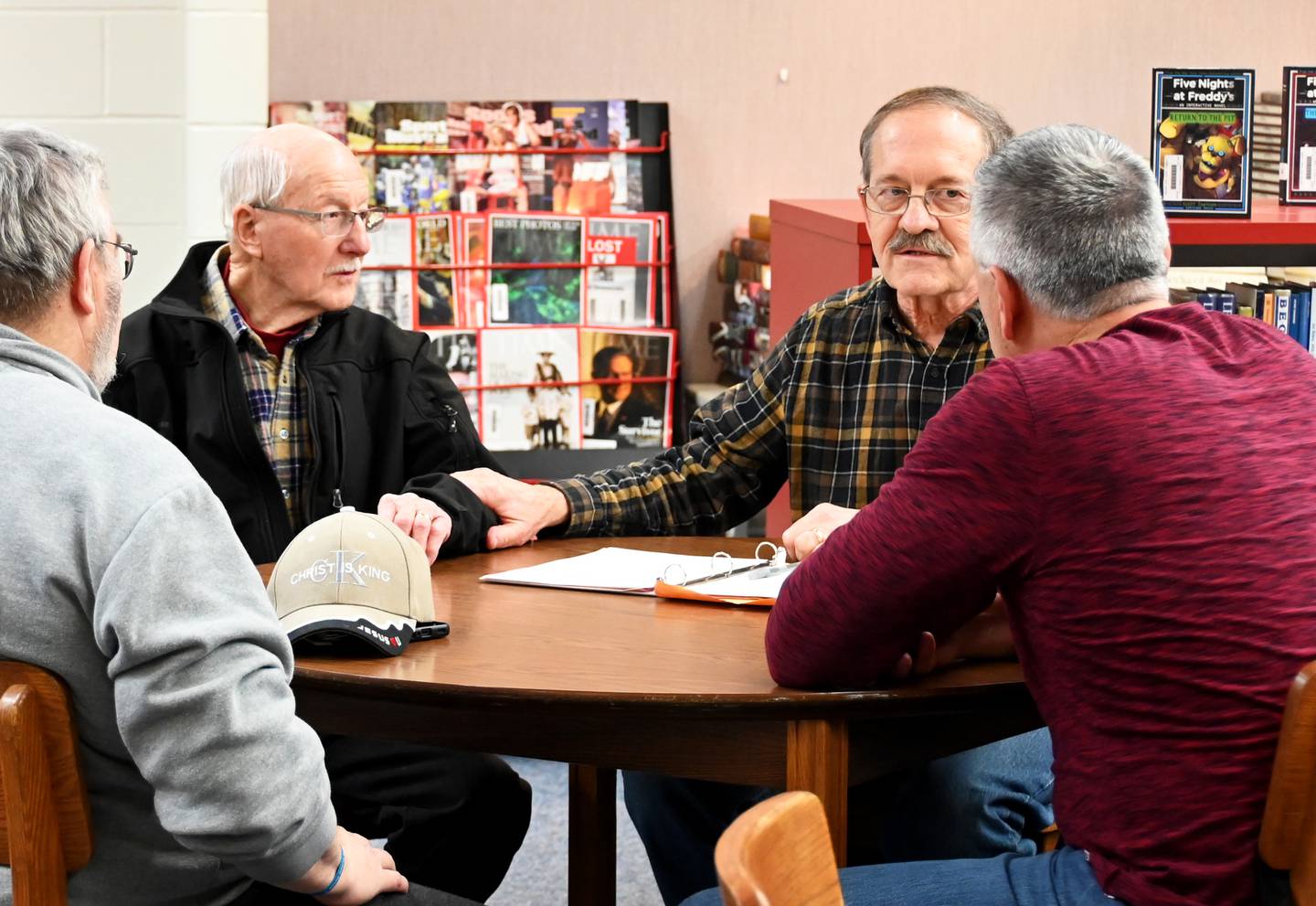 A precinct comes together to discus roles for the upcoming conventions Monday evening at the Republican Caucus held at the high school.