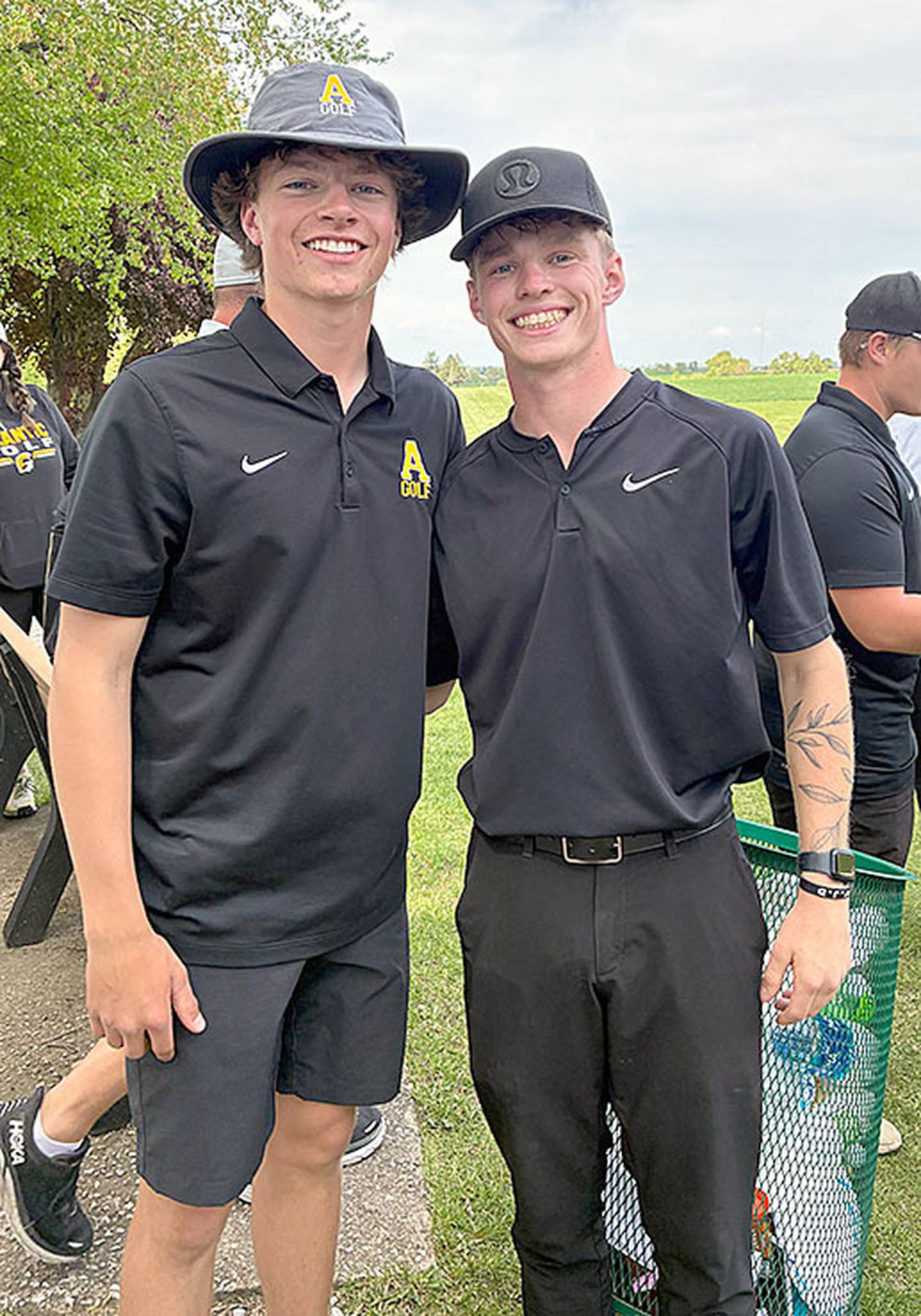Hudson McLaren (left) edged teammate Tristan Hayes (right) for medalist honors in a sudden death playoff at Wednesday's Hawkeye Ten tournament. Both Trojans shot rounds of 76 to lead Atlantic to the team title at 307.
