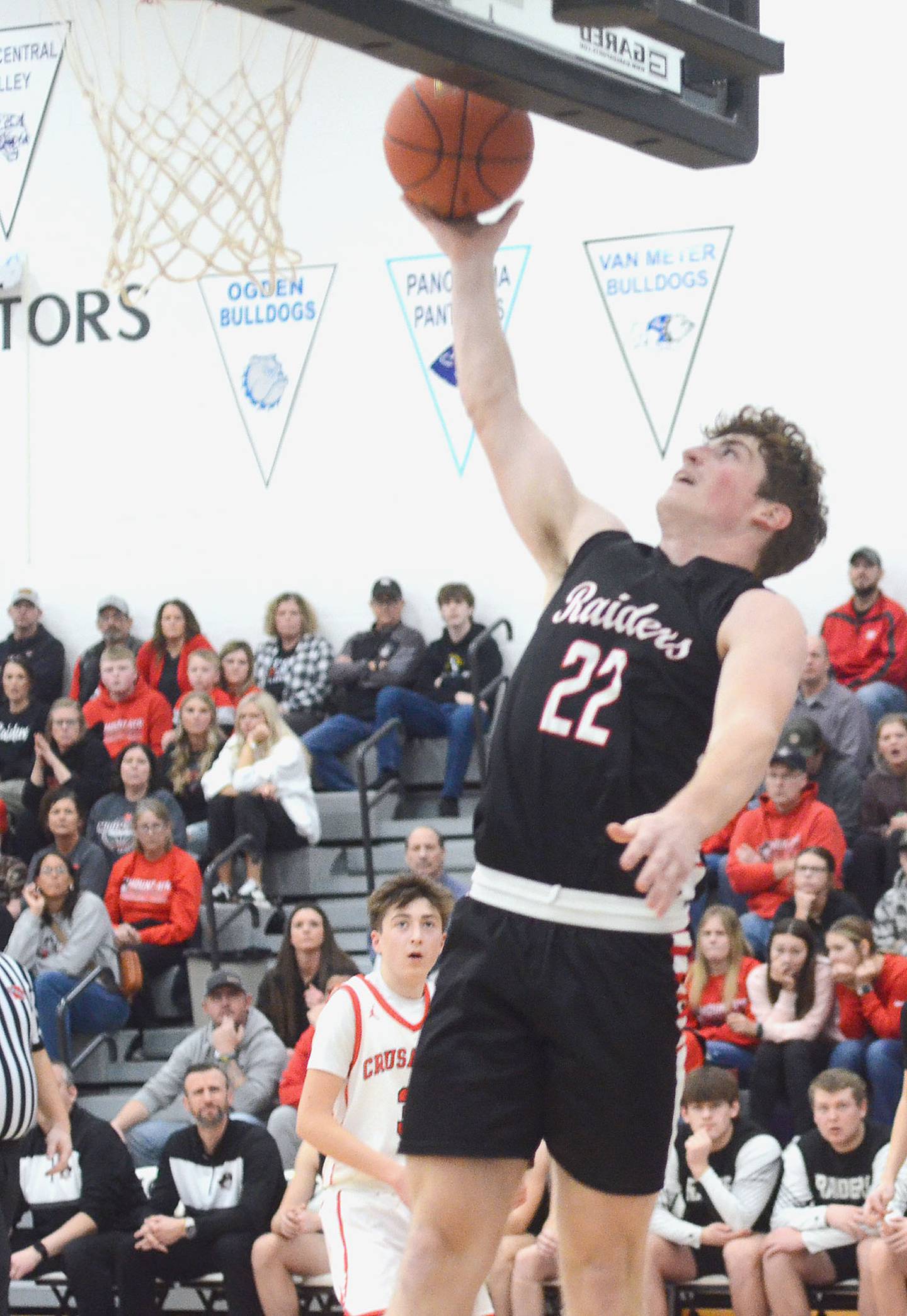 Tate Dugan of Mount Ayr finishes a layup against Coon Rapids-Bayard. Dugan five points and five rebounds in the loss.