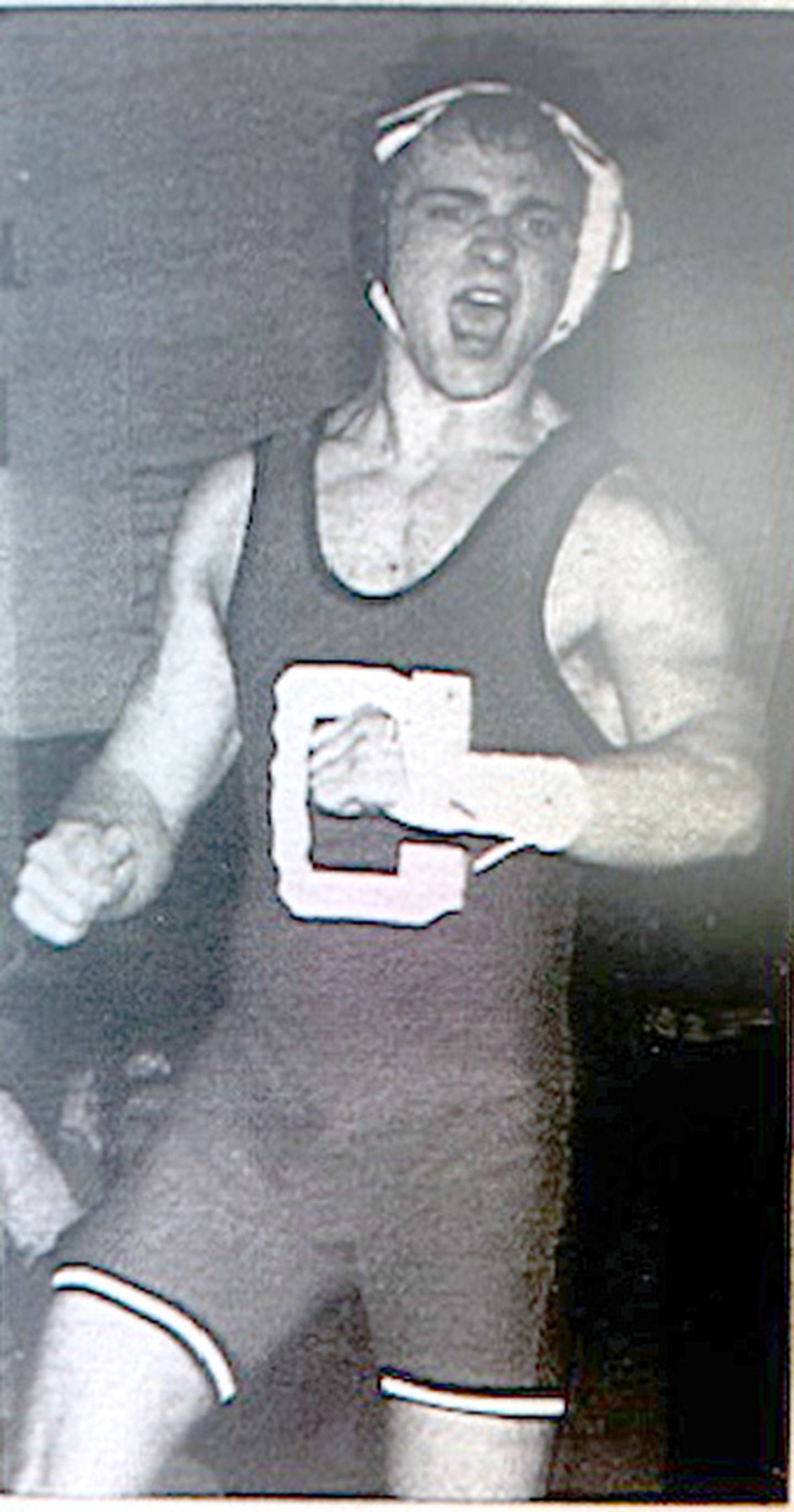 Daniel Scarberry reacts to an overtime win over Josh Abel of Winterset for a sectional championship in 2004.