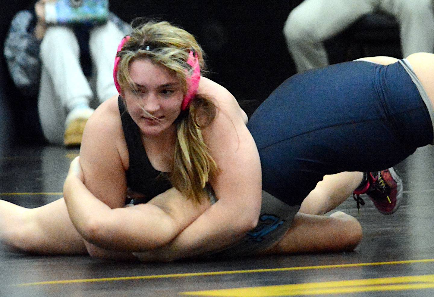 SWAT's Grace Britten puts pressure on one of her opponents in the Valkyrie Invitational Saturday, Jan. 20 at Atlantic High School.