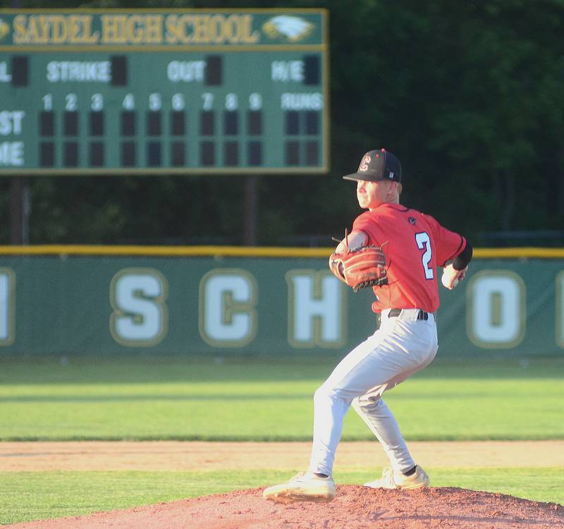 Creston starting pitcher Tanner Ray finishes his windup for a first-inning pitch against Saydel Wednesday night. Ray pitched one inning in a tuneup for the upcoming district tournament, and had two hits at the plate in a 9-4 loss.