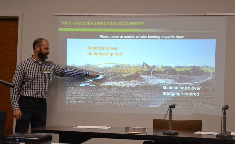 Houston Engineering Office Manager Charles Ikenberry goes over changes to the McKinley Lake dredging plan at a city council meeting.