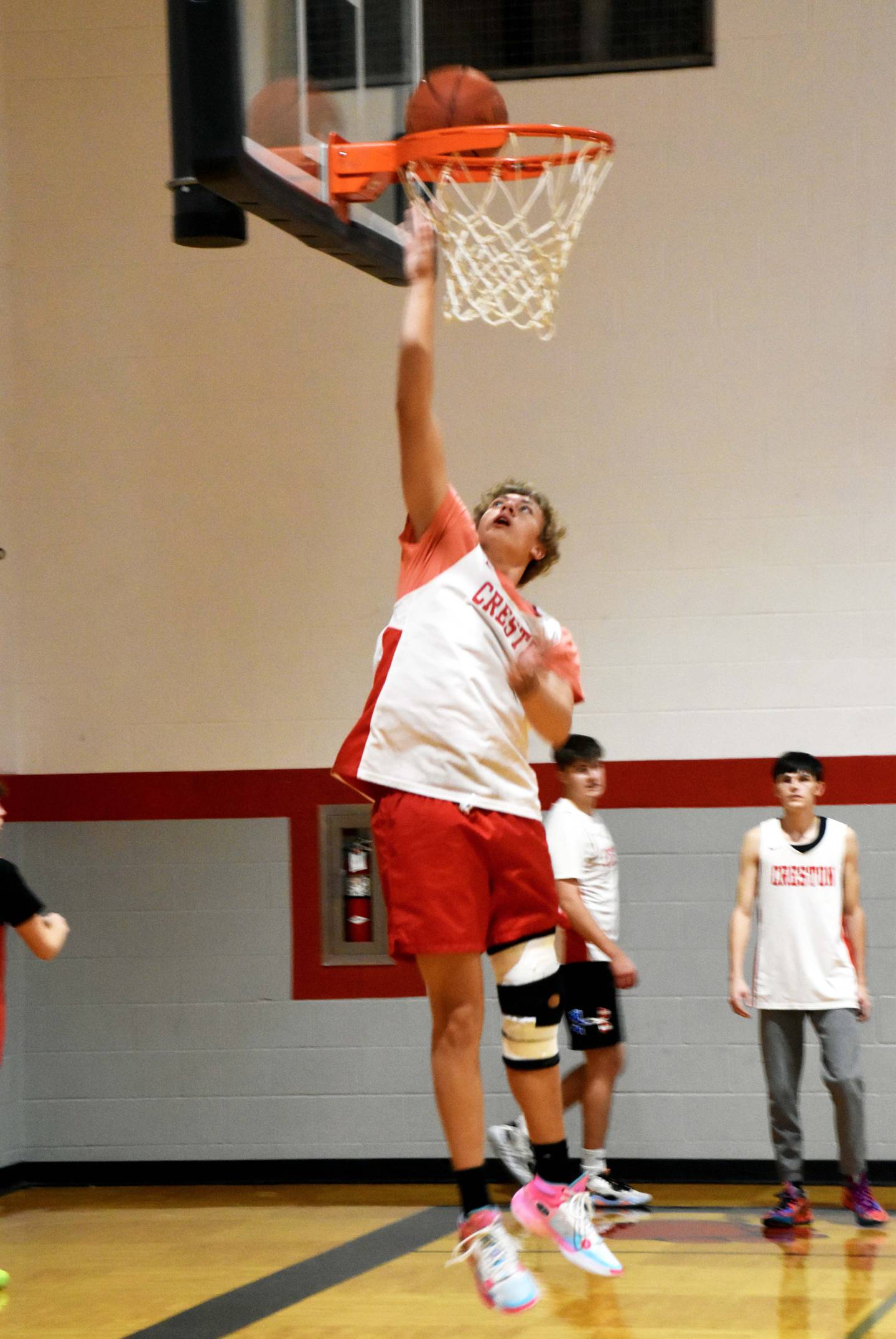 Junior Brayden Schoon puts up a layup at practice Monday.